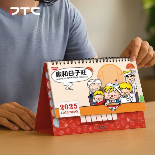 Custom-designed Nissin 2025 calendar featuring festive illustrations and branded elements