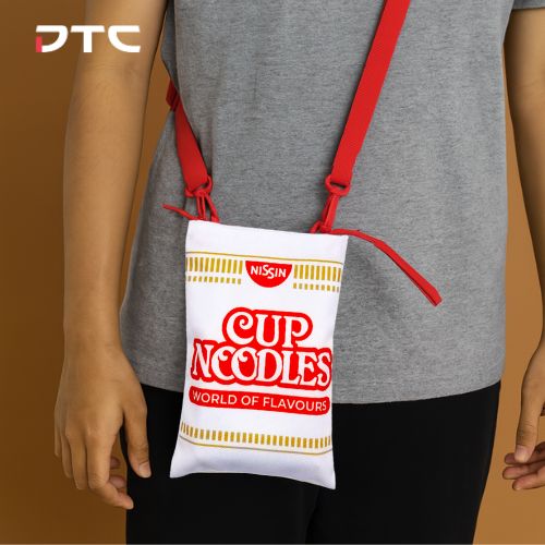 Sling bag designed to look like Nissin Cup Noodles, used as a promotional GWP item in Singapore