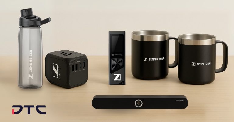 Sennheiser customised corporate gift set featuring USB drive, Tritan bottle, travel adaptor, insulated mug, and laser range finder