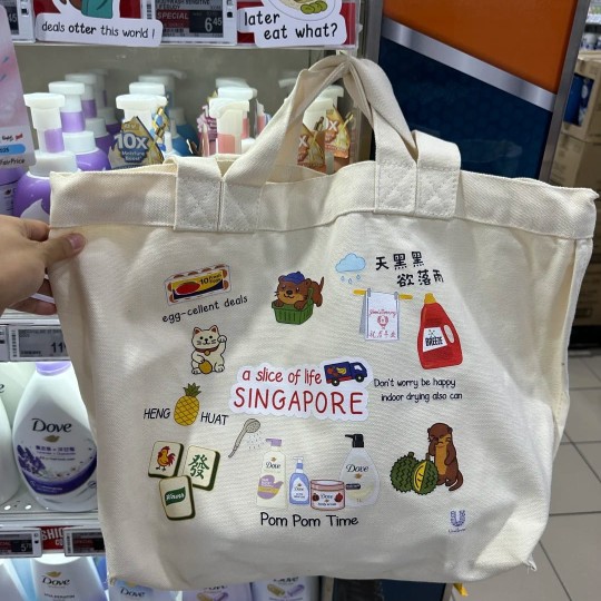 Unilever SG60 GWP tote bag featuring Singlish phrases and cultural icons.